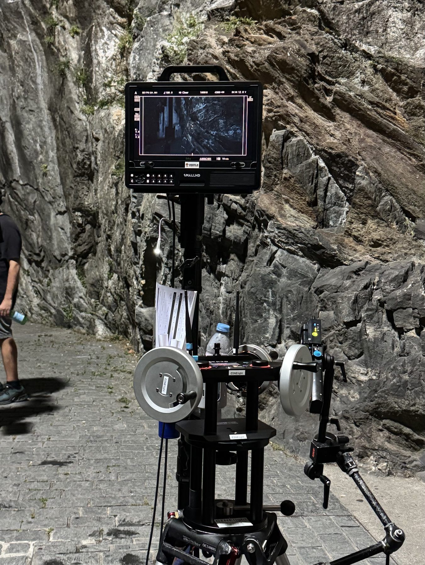 Wheels and monitor at a rock wall